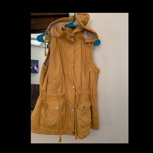 Mustard yellow vest with hood